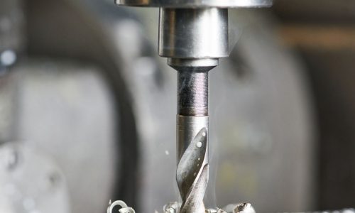 27626283 - close up machining tool drill during metal cutting process boring a hole